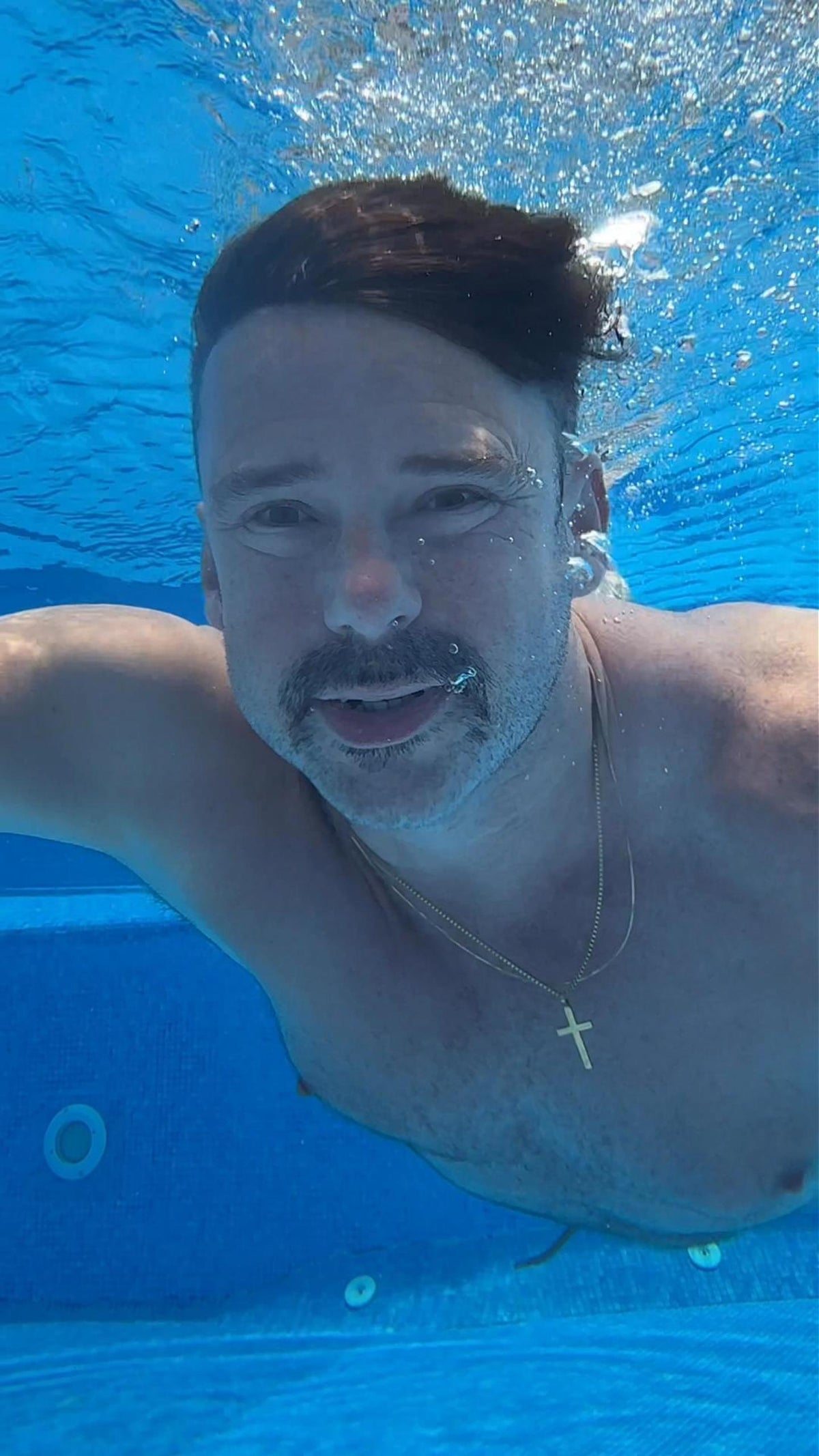 Can I Swim While Wearing a Hair System?